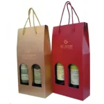Printed paper gift bags with handles / Bolsas de papel impresas con asas